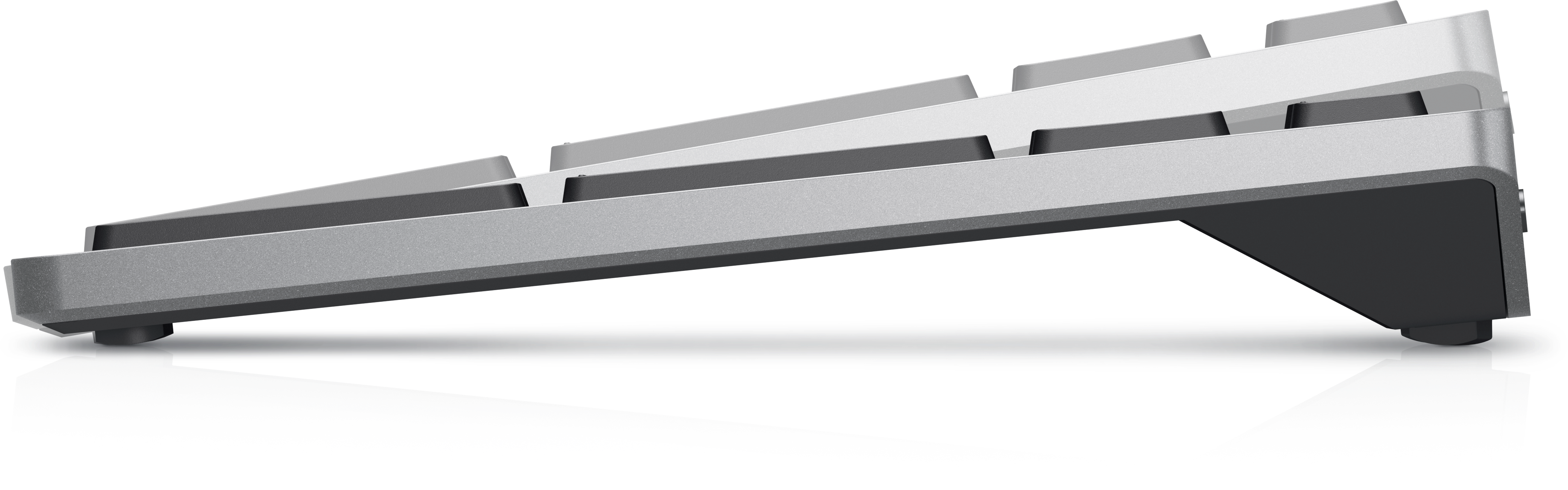 Imagine a unei tastaturi fara fir Dell pentru mai multe dispozitive KB700 care arata reglarea inaltimii produsului in partea stanga.