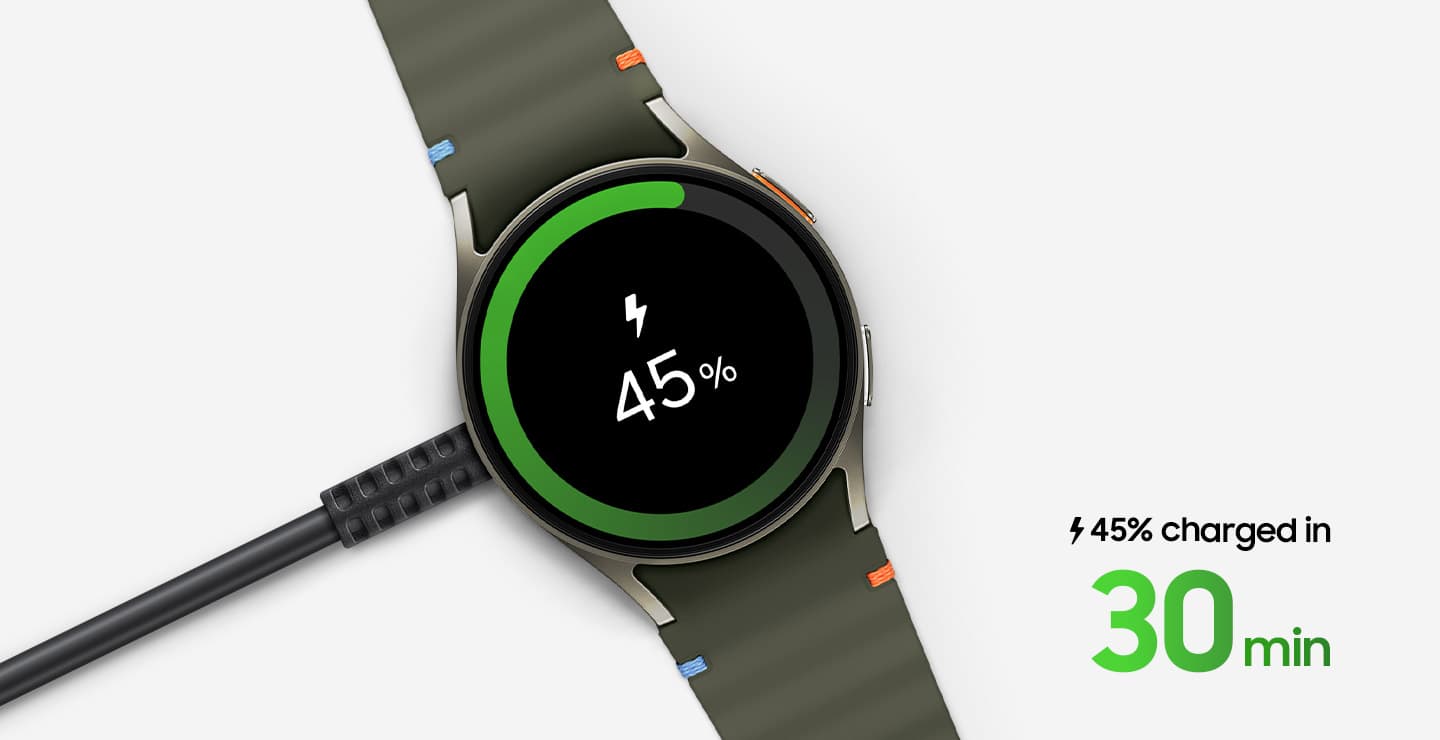 Top view of a Galaxy Watch that's connected to the Galaxy Watch Fast Wireless Charger. The watch displays shows its charging status at 45 percent. The text on the bottom right reads, '45 percent charged in 30 minutes'.
